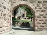 Building seen through archway
