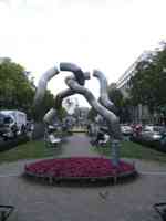 Sculpture of two huge chains links interwined