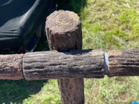 Wood-covered metal fence