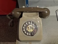 Rotary phone with numbers going counterclockwise