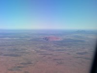 Uluṟu from airplane, with Kata Tjuṯa in background