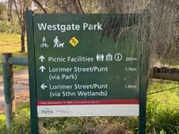 Westgate Park sign with snake warning