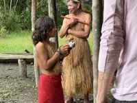 Yagua girl with monkey